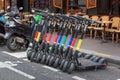 Dott shared electric scooters parked in a row in a street in Paris France