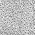 Messy black dots and rings on white background. Festive seamless pattern with round shapes. Royalty Free Stock Photo