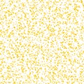 Messy yellow dots on beige background. Colorful festive seamless pattern with round shapes. Royalty Free Stock Photo