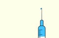 Dotted syringe Peak With Drop of Blue Liquid of vaccine. Minimal Concept with copy space. vaccination theme