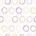 Dotty shibori tie dye sunburst circle stripe background. Seamless pattern on bleached resist white textile. Pastel dyed ink ring