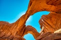 Double Arch ia a natural rock formation inside Arches National Park, Utah. Landscape under a blue sky Royalty Free Stock Photo