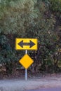 Double arrow end of road yellow street sign Royalty Free Stock Photo
