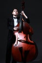 Double bass player contrabass. Classical musician