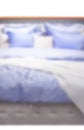 The double bed with bedclothes, isolated defocused Royalty Free Stock Photo