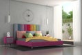 Double bed with colorful headboard in a modern bedroom