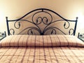 Double bed decorative metal Headboard night Royalty Free Stock Photo