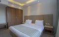 Double bed in suite of a luxury hotel room Royalty Free Stock Photo