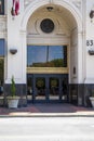 Double black doors in front of the Volunteer State Life Building in downtown Chattanooga Tennessee