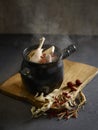 Daily Double-boiled chicken Soup served in a bowl isolated on mat side view on grey background