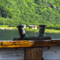 Double Bollard on the ship against of Trollfjord background. Royalty Free Stock Photo