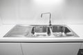 Double bowl stainless steel kitchen sink.