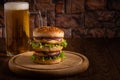 Double cheese burger with beer Royalty Free Stock Photo