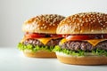 Double cheeseburgers with fresh lettuce and tomatoes, perfect for high resolution food photography and showcasing a classic gou