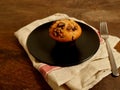 Double Chocolate Chip Muffin on plate and napkin Royalty Free Stock Photo