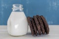 Double Chocolate Cookies Lean Against White Milk Royalty Free Stock Photo