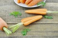 Double cut carrot on wooden table rustic Royalty Free Stock Photo