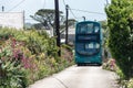 Double decker bus driving the narrow lanes in cornwall , uk , June 10 - 2022