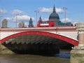 Double-Decker Bus on London's Blackfriars Bridge Royalty Free Stock Photo