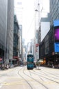 Double-decker buses travel during the streets in the Central, Hong Kong city.