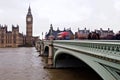 Double Decker Busses Pass Over the Thames Royalty Free Stock Photo