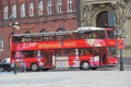 Double-decker red bus for city tours in Gdansk. Modern bus riding around city Royalty Free Stock Photo
