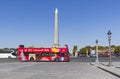 Double-decker sightseeing tour bus on Place de la Concorde in Paris Royalty Free Stock Photo