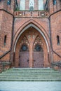 Double doors of the main entrance. Garrison Church in Olsztyn, Poland