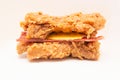 Double Down burger, a sandwich made of two pieces of fried chicken fillet instead of the typical bread, containing bacon, cheese,