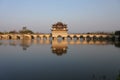 Double Dragon Bridge in Jianshui, Yunnan, China at sunset. Royalty Free Stock Photo