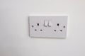 Double electric plug socket with two switches to turn on and off