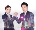 double exposure of arm wrestling between businessman and businesswoman with city background Royalty Free Stock Photo