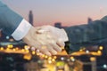 Double exposure businessman handshake for successful on city background. Teamwork concept Royalty Free Stock Photo