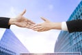 Double exposure of business Partner handshake between a man and a woman on blue sky background, business deal, handshake on modern Royalty Free Stock Photo