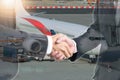 Double exposure of business people handshake with airplane Royalty Free Stock Photo