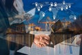 Double exposure of business people handshake greeting deal concept on Industrial port with containers cargo ship background and m