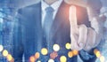 Double exposure of Business vision of Business man is pointing command blended with city night background Royalty Free Stock Photo