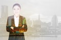 Double exposure of business woman crossed arms with city backgr Royalty Free Stock Photo