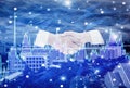 Double exposure-businessman handshake with businesswoman negotiate mission complete,background cityscape and graph stock with