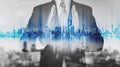 Double exposure businessman holding blue city hologram, real estate business technology