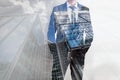 Double exposure of businessman and modern skyscrapers. Business leader, career concepts