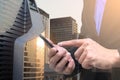 Double exposure of businessman using phone with city scape night Royalty Free Stock Photo