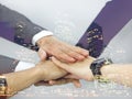 Business people Teamwork Concept,Group of diversity people putting their hands together ,hand a young business Royalty Free Stock Photo