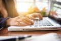 Double exposure of Close up business woman hand working on laptop computer on wooden desk Royalty Free Stock Photo