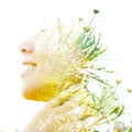 Double exposure close up profile portrait of a young pretty woman interwoven with delicate yellow flowers seemingly growing from Royalty Free Stock Photo