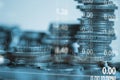 Double exposure of coin stack with stock market screen chart boa Royalty Free Stock Photo