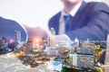 Double exposure concept. Investor business handshake with city night background. Royalty Free Stock Photo