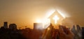 Double exposure of cut out paper church and city sunset Royalty Free Stock Photo