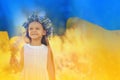 Double exposure of cute girl wearing flower wreath outdoors and Ukrainian flag