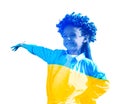 Double exposure of cute girl wearing flower wreath and Ukrainian flag